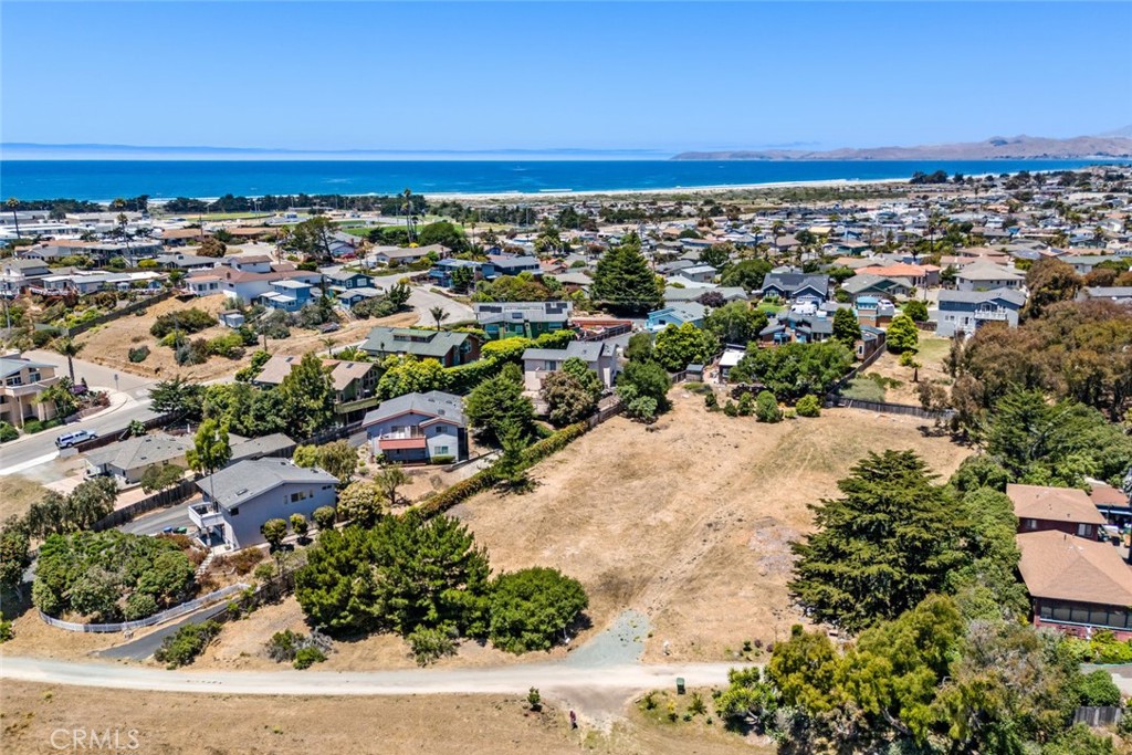 Rare Ocean View Development Opportunity in Morro Bay: Welcome to 545 Atascadero Road — a prime 25,000 sq ft (0.57 acres) ocean view lot in one of Morro Bay’s most coveted neighborhoods. This expansive and gently sloped rectangular parcel is zoned R4 for high-density residential development, offering a rare opportunity to build a legacy property just minutes from the Pacific Ocean. Surrounded by well-established, high-value homes, this site is one of the last remaining infill development opportunities within city limits. The lot’s central location provides easy access to Highway 41, and is ideally situated less than a mile to the beach and just over a mile to Morro Bay’s vibrant Downtown shops, restaurants, and Embarcadero. With its favorable topography, panoramic views, and versatile zoning, this property is perfect for investors, developers, or visionaries looking to create a multi-unit residential project on California’s iconic Central Coast. Whether you’re planning a luxury townhouse development or long-term income property, this land delivers exceptional potential in a location that continues to grow in value and appeal. Don't miss this chance to shape the future of Morro Bay.
