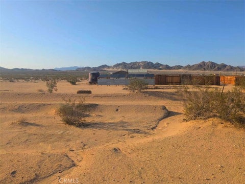 Photo of 79032 Indian Trail, 29 Palms, CA 92277 (MLS # HD26149015)