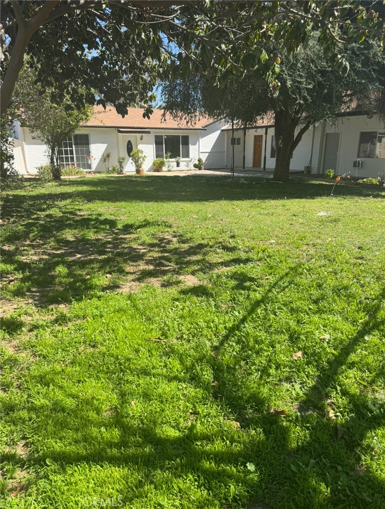Excellent Opportunity: Beautiful House with Stunning Multi-Unit Potential. Welcome to your dream property! Don’t miss this incredible opportunity to own a large, versatile property perfect for extended families or entertaining guests. This beautifully maintained home features 8 bedrooms and 5 bathrooms. Live in one section of the house and rent out the other, maximizing your investment potential. Enjoy a cozy fireplace and central air conditioning. Situated on a big lot, the home offers dual driveways providing ample parking for multiple vehicles and even RVs. The yard is a true oasis, complete with a gorgeous pool and an abundance of fruit trees, making it an ideal spot for hosting unforgettable gatherings with family and friends. Located in a prime area, you're just minutes from top-rated restaurants, shopping centers, parks, and convenient public transportation.