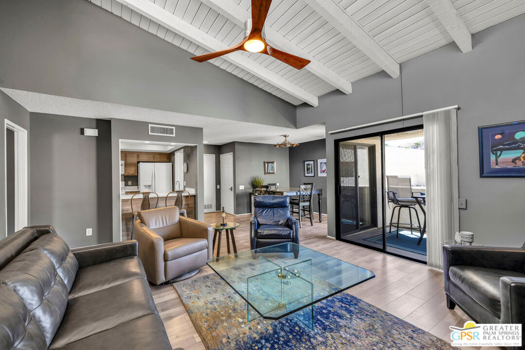 I'm proud to present a priced-right, move-in ready, comfortably furnished, south Palm Springs condominium at The Versailles! You will be delighted with the light and airy good vibes of this upper-level condo with vaulted ceilings, clerestory windows, balconies off the living room and bedrooms with mountain views. The Versailles is a highly coveted community known for its lush, park-like setting, desirable location and close proximity to shopping and restaurants. Turn-key furnished per seller inventory. The HOA fee includes water, garbage, building and roof. And don't forget, you own the land! Why compromise when you can have it all?