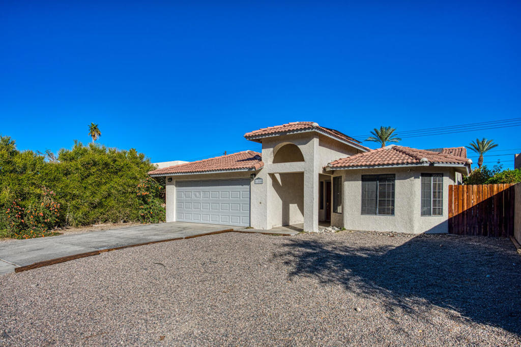 This beautifully maintained 3-bedroom, 2-bath single-level pool home is move-in ready, featuring owned solar panels, stunning mountain views, and no HOA fees.Inside, enjoy vaulted ceilings, tile flooring, recessed lighting, and Smart Home upgrades including a smart thermostat, doorbell, and lock. The spacious living room offers a cozy fireplace, wet bar with sink and glass shelving, and direct access to the backyard.The kitchen boasts white cabinetry, granite tile countertops, stainless steel appliances, and opens to a bright dining area with bay windows. All bedrooms are generously sized, with the primary suite featuring private backyard access and an updated en-suite with a walk-in shower. The secondary bedrooms share an updated full bath with a tub/shower combo.Step outside to your private entertainer's backyard with an in-ground pool and spa, powered by a newly installed Pentair smart system with ScreenLogic remote. A covered patio provides the perfect spot to unwind, and the home includes an attached 2-car garage.Conveniently located near shopping, dining, and more, this turn-key home also offers great vacation rental potential. Don't miss out!