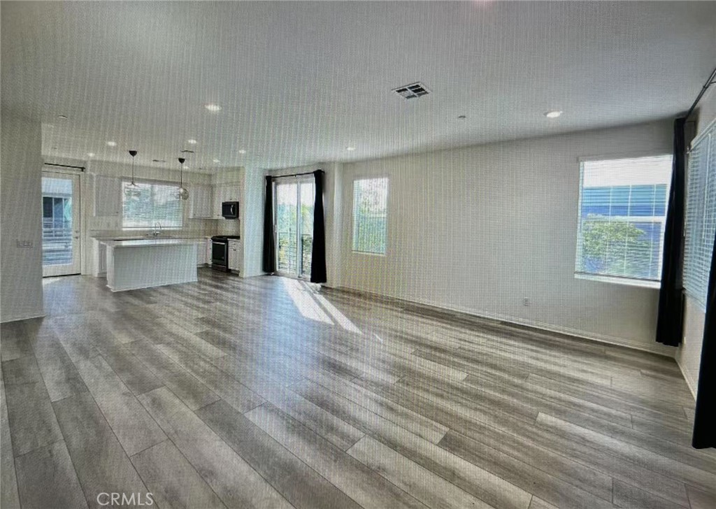 This beautifully located condominium sits in the vibrant heart of Irvine, just a short walk from Diamond Jamboree Plaza and The District, two of the area's premier destinations for shopping, dining, and entertainment. Offering 1,848 square feet of thoughtfully designed living space, the home features four spacious bedrooms, three and a half bathrooms, a covered patio, and an attached two-car garage. The open floor plan creates a seamless flow between the living, dining, and kitchen areas, making it ideal for both everyday living and hosting guests.
Residents enjoy access to top-tier community amenities, including a luxurious resort-style pool, relaxing spas, well-maintained village parks, and a beautifully equipped BBQ area. This is a rare opportunity to experience comfort, convenience, and community living all in one.