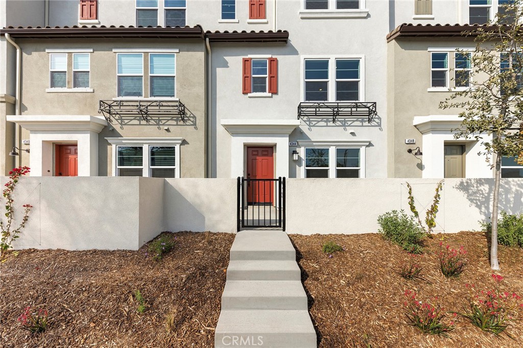 This modern, energy-efficient 3-story townhome is located in the sought-after Lotus Arcadia community and features 4 bedrooms and 3.5 bathrooms. The first floor offers a private bedroom suite with its own bathroom, perfect for guests or extended family, along with direct access to a two-car attached garage. The second floor is an open-concept living space with a bright and spacious great room, dining area, and a contemporary kitchen equipped with a large center island, walk-in pantry, plus a convenient half bath for guests. On the third floor, you’ll find a luxurious primary suite with a walk-in closet, two additional bedrooms sharing a full bathroom, and an upstairs laundry room. Solar system is fully paid off. Enjoy beautifully landscaped common areas, and a prime location close to the Metro Gold Line, 210 & 605 freeways, Santa Anita Mall, parks, and dining.