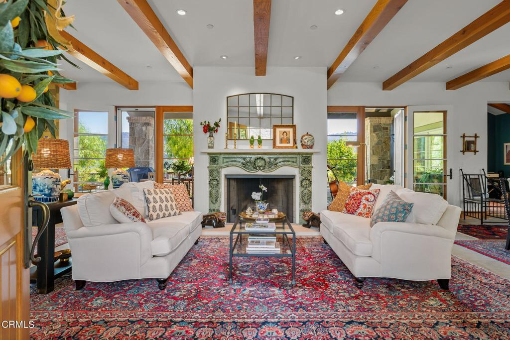 Set on a breathtaking mountainside, this stunning 3-bedroom, 2 and 1/2-bathroom home, 1 bedroom is now a private study, offers the perfect blend of luxury, tranquility, and natural beauty. Surrounded by sweeping mountain views and your very own vineyard, this property is a true retreat for those who appreciate privacy and picturesque landscapes.Inside, the home features an open and airy layout with large windows that frame the stunning scenery. The spacious living area is perfect for relaxing or entertaining, seamlessly connecting to a gourmet kitchen with high-end appliances, custom cabinetry, and a large island. Both bedrooms are designed for comfort, with en-suite bathrooms featuring elegant finishes. An additional full bathroom adds convenience, while the dedicated study provides a quiet space for work or creativity.Step outside to your personal vineyard, where you can cultivate and enjoy the fruits of your land. Whether sipping wine on the patio as the sun sets over the mountains or strolling through the vines, this property offers a lifestyle of serenity and sophistication. Ideal for nature lovers, wine enthusiasts, or anyone seeking a private escape, this extraordinary home is a rare find.