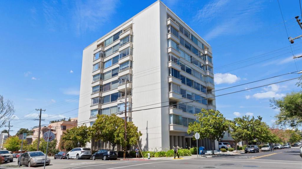 Fantastic, panoramic views: Golden Gate Bridge, Bay Bridge, & City lights! Best underground secured parking garage space, #26, closest to elevator with larger space on both sides. Newly painted. Bright, open floor plan lives large & easily adapts to different furniture placement. Formal entry with huge storage closet, can double as kitchen pantry. Updated kitchen with beautiful views, classic shaker cabinets, deep granite countertops with bar seating to facilitate meal preparation. Large Living room also has amazing views & wall that fits a huge screen T.V. Marvelous primary bedroom is spacious, with view to the Bay, updated bath & large walk-in closet. Berkeley Town House is a 55+ Co-op community offering an easy maintenance life. Caring community facilitates friendships through many activities offered such as walking & exercise groups, movie or game nights, classes such as art or Spanish, potlucks & more. Ground level community center with kitchen, huge dining and gathering areas. Piano. T.V. Ping Pong Table. Exercise equipment. Incredible patio with comfy seating, dining tables, BBQ & pergola for events. Easy access to U.C. Berkeley, theatre & arts. Walk to BART, Telegraph & Shattuck Avenues, restaurants, shopping and other entertainment.