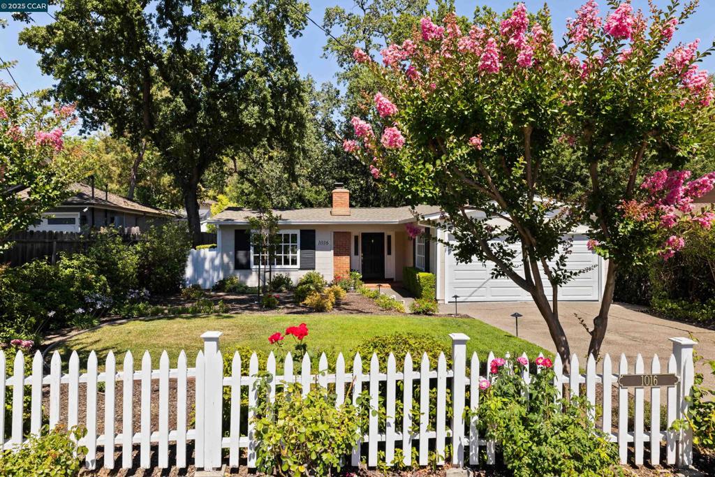 Nestled behind a white picket fence in one of Lafayette’s sought after neighborhoods, 1016 Dyer Drive offers the charm of classic California living with a Norman Rockwell vibe and offers the comfort and convenience today’s buyers crave. Just a short stroll to Lafayette’s vibrant downtown, you’ll enjoy a lifestyle filled with boutique shopping, gourmet dining, cozy cafés, and weekend farmers’ markets—all within walking distance of your front door. Commuting is a breeze with nearby access to BART and major freeways only minutes away, while outdoor enthusiasts will love the close proximity to the Lafayette Reservoir & the Lafayette/Moraga Regional Trail. Dyer Drive is also roughly one mile from all three of Lafayette’s top-rated elementary, middle and high schools. This beautifully, updated residence has curb appeal and is filled with natural light. Features-vaulted wood-beamed ceilings, a freshly painted neutral palette, newly refinished wide plank hardwood floors, and modern lighting throughout. The expansive living room features large windows on every side, a charming fireplace, and easy flow to the dining area and out to the backyard. Kitchen w/gas range, new faucet & cab.hardware, and nook; hall bath and primary bath jetted tub & shower; backyard w/paver patio and shade trees.