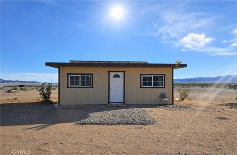 Photo of 84951 Eddie Albert Rd, 29 Palms, CA 92277 (MLS # CV26037870)