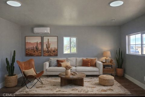 Photo of 84951 Eddie Albert Rd, 29 Palms, CA 92277 (MLS # CV26037870)