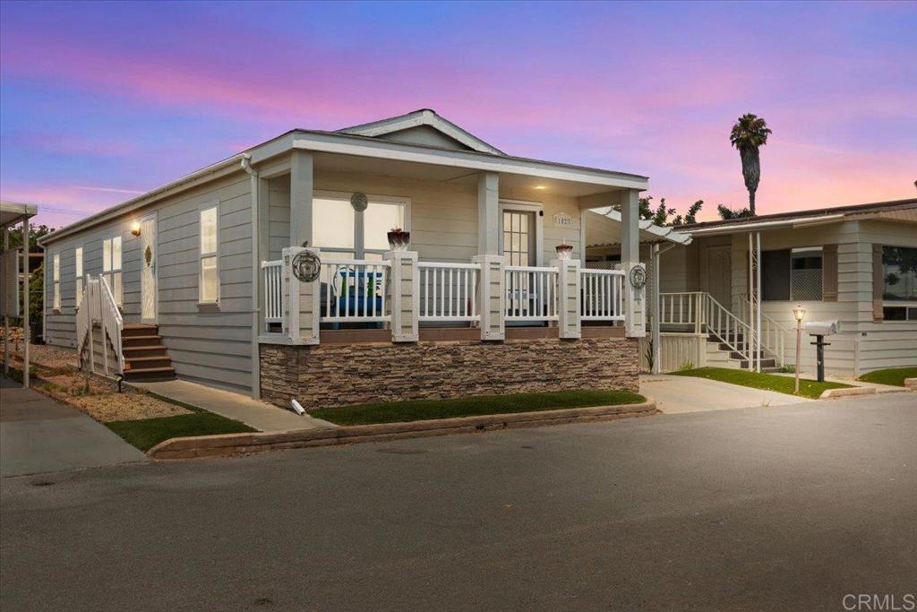 Step into the perfect blend of comfort, convenience, and community in one of Chula Vista's most sought-after all-age mobile home parks. Tucked away on a peaceful cul-de-sac, this charming 3-bedroom, 2-bath home was built in 2007 and offers about 1,040 sq. ft. of bright, open living space ideal for both cozy nights in and gatherings with friends and family. The kitchen is ready for all your favorite recipes with a refrigerator, microwave, oven, and garbage disposal included. Large windows fill the home with natural light, creating a warm and inviting atmosphere. Enjoy your own private backyard for relaxing, plus a welcoming front porch that's perfect for morning coffee. Parking for two vehicles means convenience is built right in. As part of this vibrant community, you'll have access to a billiard room, pool, and clubhouse a great place to connect with neighbors. All this, just minutes from schools, parks, shopping, and freeway access.