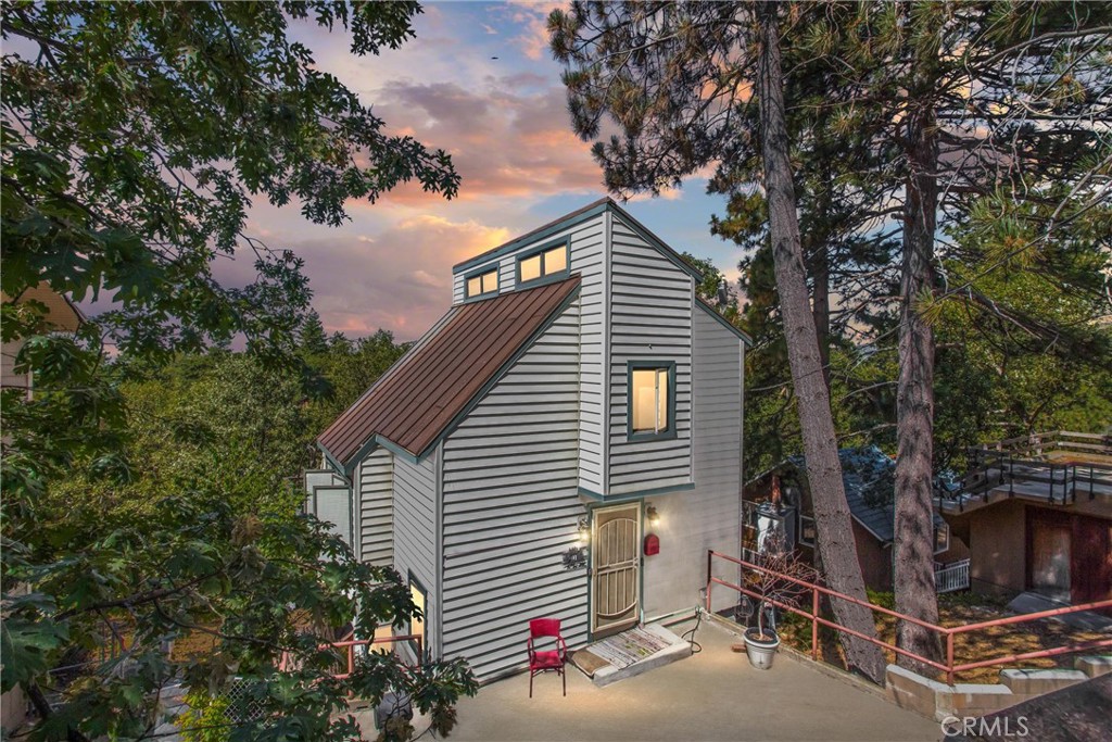 Charming Mountain Retreat in Running Springs! Welcome to 30421 Live Oak Drive, an enchanting cabin in the heart of the picturesque Running Springs
community. This charming 4-bedroom, 3-bathroom home + additional detached 5th bedroom, offers the perfect blend of cozy mountain living with all the
amenities and is just minutes away from local attractions like Snow Valley Ski Resort, Lake Arrowhead, and Big Bear. Step inside to find a warm and inviting floor
plan featuring a spacious living room with vaulted ceilings, large windows that let in an abundance of natural light, and a warm fireplace that's perfect for those
chilly mountain evenings. The kitchen boasts stainless steel appliances and stone countertops. Enjoy the crisp mountain air on your private deck and spa
overlooking lush greenery and towering trees. With plenty of space for outdoor dining and relaxation, the expansive yard is a true nature lover’s paradise,
providing tranquility and privacy. Whether you're looking to enjoy summer barbecues or winter snowfall, this home delivers year-round enjoyment. Additional
highlights include a spacious master suite with an en-suite bath, updated flooring throughout, and ample parking with a two-car garage. Perfect as a full-time
residence, weekend getaway, or vacation rental, this home offers easy access to hiking trails, outdoor adventures, and the quaint charm of Running Springs
Village. Don't miss out on your opportunity to own a slice of mountain paradise. Schedule your showing today and start living the mountain life! Close to Lake
Arrowhead, Big Bear, and Snow Valley Ski Resort