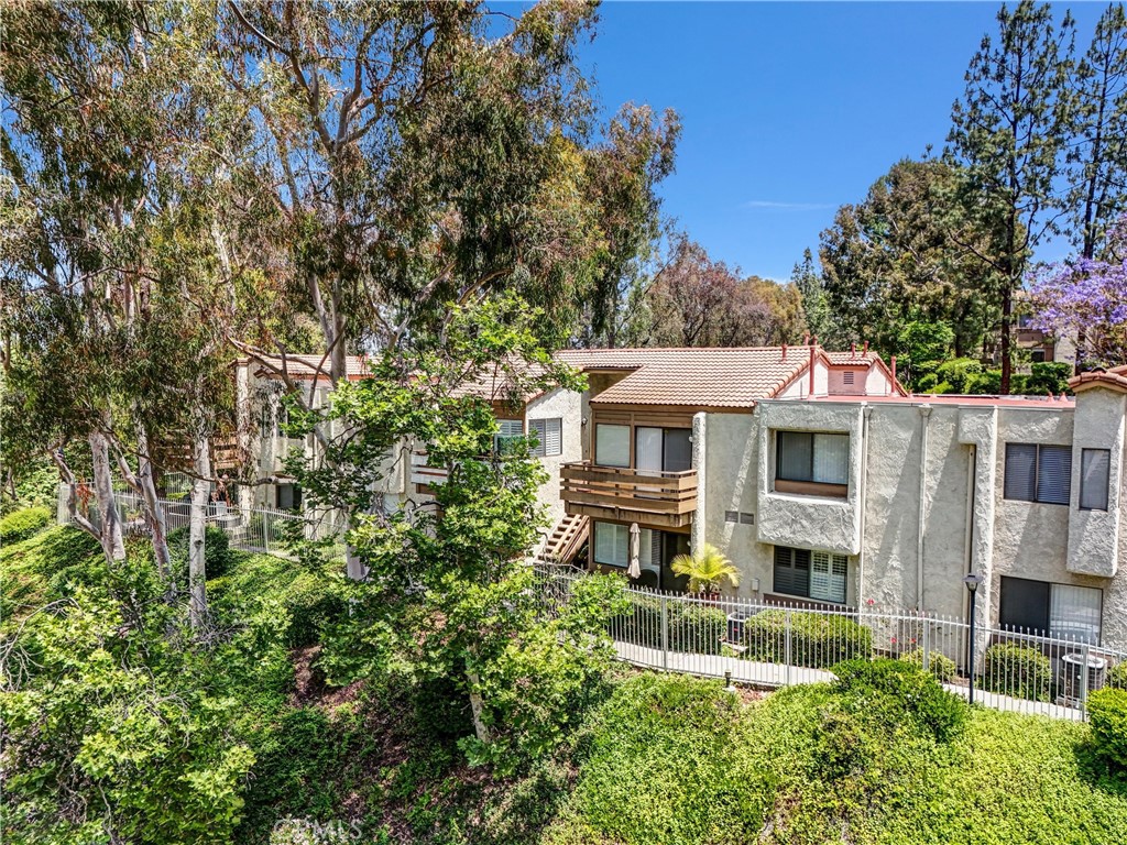 **Price Improvement and Brand New Paint Job!** This charming retreat is not only located in the Diamond Bar Tennis Club Community but is also equipped with an in-unit laundry closet with a washer and dryer. Welcome home to this beautifully updated top-floor 1-bedroom, 1-bath condo in the highly sought-after Diamond Bar Tennis Club Community! Designed for comfort and convenience, this inviting residence features a bright, open floor plan, creating a spacious and airy feel. Step onto your private balcony, where serene, tree-lined views offer a peaceful escape. Inside, modern upgrades make this home move-in ready. Freshly painted throughout and with sleek new touches, every detail has been thoughtfully designed for contemporary living. Enjoy two assigned carport spaces for hassle-free parking and take advantage of the resort-style amenities this exclusive gated community has to offer. With three heated pools, relaxing spas, four lighted tennis courts, a clubhouse for gatherings, and 24/7 security, you’ll experience both luxury and peace of mind. Plus, the community is adjacent to the Diamond Bar Golf Course and Sycamore Canyon Park, providing endless outdoor enjoyment.
With easy access to freeways, shopping, dining, and entertainment, this prime location is perfect for those seeking a balance of relaxation and convenience. Don’t miss out on this fantastic opportunity—schedule a tour today!
