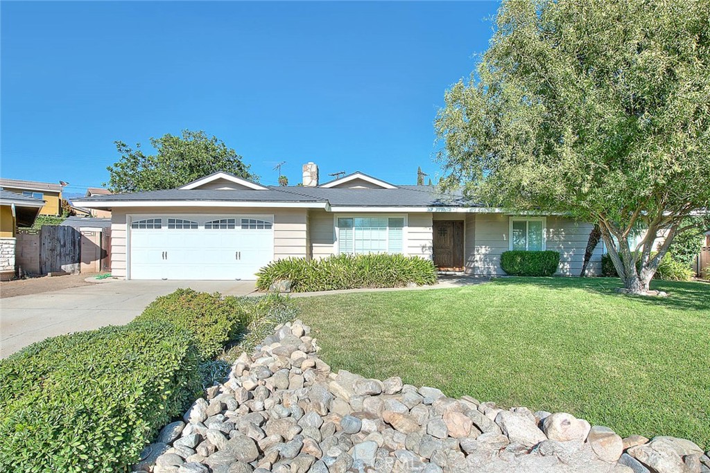 Welcome to this beautifully maintained single-story home featuring 4 bedrooms and 2 bathrooms, located in a desirable Pomona neighborhood within the Claremont Unified School District.
This property sits on an extremely large lot and offers plenty of space for outdoor living, entertainment and ADU addition. Enjoy the sparkling pool, pickleball court, large storage shed, and a covered patio—perfect for hosting gatherings.
Inside, the entryway and kitchen feature elegant travertine tile floors. The kitchen is updated with granite countertops, stainless steel appliances, and even includes a built-in computer workstation for added convenience. The living room boasts a cozy fireplace, and plantation shutters are installed throughout the home for a clean, stylish look. Elegant crown molding just adds to the finishing touches of this home.
This home also has newer dual paned windows throughout and Solar Panels for low utility bills!!!
The primary bedroom includes its own private sliding glass door that leads directly to the backyard, creating a peaceful retreat.
Conveniently located near the University of La Verne, downtown La Verne and Mountain Meadows Golf course! This home offers both comfort and convenience in a highly sought-after school district.