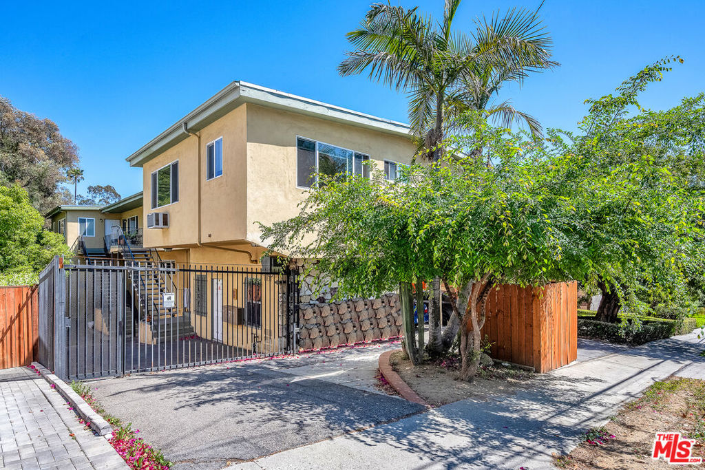 Don't miss this spacious 2-bedroom, 1-bathroom first-floor unit located just north of Sunset Boulevard, steps from the trendy shops and restaurants of Sunset Junction. Featuring a wall mounted AC unit, 2 parking spaces, gas stove, and ample built in closet spaces, this spacious unit also includes a refrigerator and access to an on-site laundry area. Located just north of Sunset Boulevard near the fashionable shops and eateries of the famous Sunset Junction area, this apartment is just minutes from the outdoor recreation opportunities at the Silver Lake Reservoir. Don't let this Silver Lake gem pass you by!