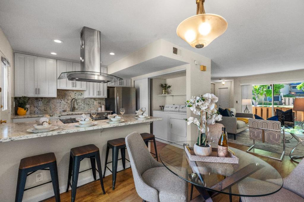 Welcome to this beautifully updated 2-bedroom, 1.5-bathroom unit in the heart of Sunnyvale. This light-filled residence offers an inviting open floor plan with a spacious living room, large windows, and seamless flow to the dining area and kitchen. The modern kitchen features sleek countertops, stainless steel appliances, and ample cabinetryperfect for everyday living and entertaining. The home includes generously sized bedrooms with plenty of closet space, and bathrooms designed with comfort in mind. Enjoy a private balcony/patio, ideal for morning coffee or relaxing evenings. Additional highlights include in-unit laundry, assigned parking, and well-maintained community amenities such as landscaped grounds, pool. Located in a prime Sunnyvale neighborhood, youll appreciate being close to top-rated schools, major employers (Apple, Google, LinkedIn), Caltrain, and vibrant shopping and dining options. Easy access to Hwy 101, 237, and Central Expressway makes commuting a breeze. Dont miss the opportunity to own a stylish and convenient home in one of Silicon Valleys most sought-after locations!