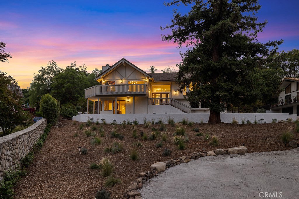 Welcome to your Completely Renovated, Modern-Contemporary Masterpiece nestled on a Private road in the serene back corner of Ojai. This Stunning property offers an Unparalleled combination of Secluded Tranquility and High-End, Designer-Curated Luxury, having been meticulously transformed by a Professional Designer into a 2,807 square foot Sanctuary featuring Five bedrooms and Four bathrooms. The Heart of this Home is the Spectacular open-concept living area, anchored by a custom Gourmet Kitchen outfitted with all new, High-End Appliances, and the attention to detail continues into the Luxurious Custom Bathrooms, offering a true Spa-like retreat. This renovation is comprehensive and worry-free, featuring New Hardwood Floors throughout, a New HVAC system, a New Septic System, and multiple New Windows that flood the space with Natural Light, all complemented by New Garage Doors that complete the Contemporary Exterior. Situated on a generous 31,102 square foot lot, this home provides incredible space and maximum privacy, ready for its next discerning owner to enjoy the famous Ojai tranquility undisturbed.