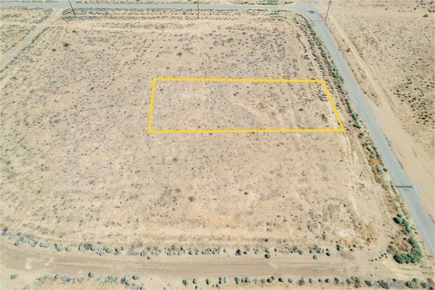 This 0.66-acre property in California City, Kern County features paved road access, available water service, and zoning for multi-family residential use! Located near the California City Airport, Mojave Air & Space Port, and Hyundai’s testing facility, it’s in a developing area with plenty of possibilities. The surroundings are open and peaceful, with views of the distant hills and desert landscape. You’re also close to local shops, schools, and parks, plus outdoor spots like Cal City MX Park and the Desert Tortoise Research Natural Area. Whether you're thinking of building a home, duplex, or holding the land as an investment, this lot offers flexibility and potential. A great piece of land to plan something long-term or start something new!