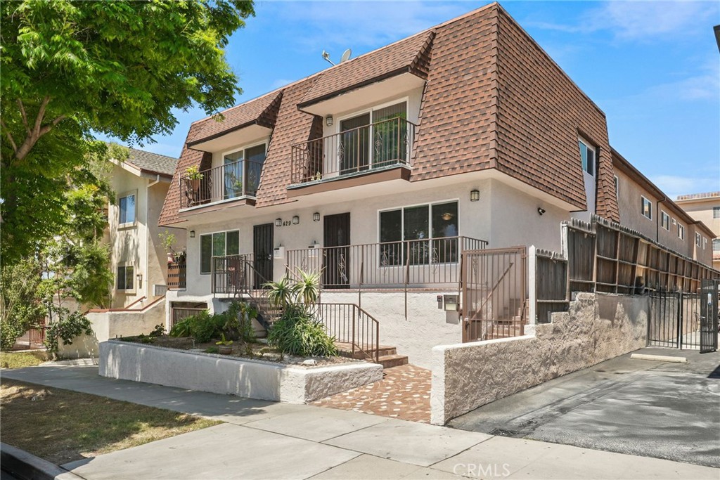 Welcome to 429 E. Providencia Avenue located in the heart of downtown Burbank. This charming 2-bedroom 1.5-bathroom townhome offers an open floor plan creating a seamless flow from the living room through the dining room and kitchen. The main level features an updated kitchen equipped with quality cabinets, Ubatuba granite countertops, ample counter space, tile floors and more. The kitchen opens to the living room making this a great space to entertain. There is also a half bath and stacked laundry on the first level. The second level has two sizeable bedrooms and a full bathroom. The upstairs bathroom features a large jacuzzi style bathtub, separate shower and dual sink vanity. This light and bright property has an abundance of natural light throughout both levels of the home. Skylights on the second level of the home enhance the natural lighting throughout. The exterior of the building has recently been updated with new windows and sliding doors for all of the units, new exterior paint and stucco and plumbing upgrades. With a low HOA and this property's relatively close proximity to downtown Burbank, AMC theatre, Ikea, the 5 freeway, Metro, Metrolink, shops, markets and restaurants are some of the perks of living in this excellent location. Don't miss the opportunity to make this amazing townhome your new home!