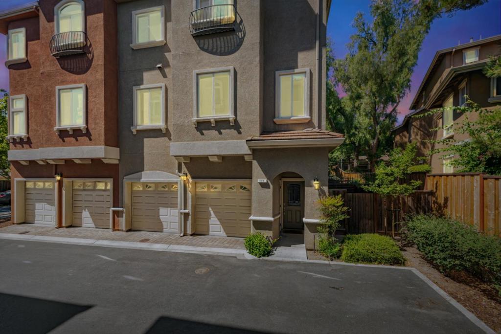 Welcome to this bright and beautiful 2010 built corner unit townhome with PUD ownership. This move-in ready property features two spacious primary suites, each with its own private bathroom, perfect for guests or shared living. The home boasts an open and inviting kitchen, a cozy backyard patio for relaxing or entertaining, and a 2-car side-by-side garage, a rare find in townhome living. Situated in a quiet and friendly neighborhood, you'll enjoy quick access to Highways 87 and 85 and be just minutes from shops, grocery stores, and restaurants. One of the best perks is being within walking distance to the iconic Communications Hill staircase and scenic trails-ideal for morning jogs or evening strolls. Come experience the comfort, convenience, and lifestyle this home has to offer!