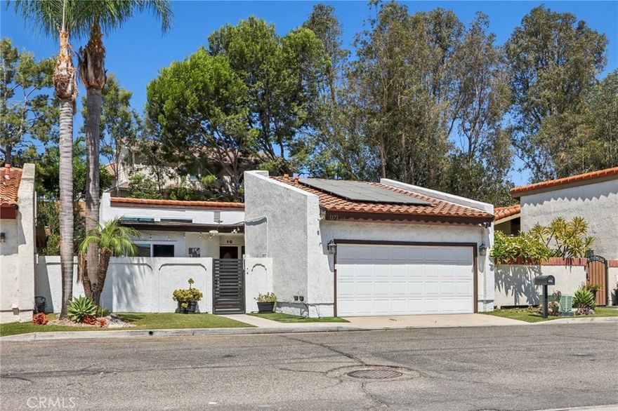 Welcome to Las Palmas Estates! This beautifully remodeled single-family home offers 3 bedrooms, 2 bathrooms, and 1,589 sq. ft. of comfortable living space. Step inside to soaring high ceilings, fresh interior paint, and tile flooring throughout, creating a bright and clean feel. The heart of the home is the custom kitchen, featuring stylish finishes and thoughtful design, while both bathrooms have been tastefully remodeled. A new HVAC system ensures year-round comfort. Enjoy the versatile enclosed patio filled with natural light—perfect for a sunroom, or extra lounge space. The low-maintenance front yard with turf and private backyard with lush, mature foliage make outdoor living effortless. Las Palmas Estates offers resort-style amenities including a sparkling swimming pool, barbecue area, and beautifully maintained common grounds. This move-in ready home combines modern upgrades, functional living, and an unbeatable community lifestyle. Don’t miss your chance to make it yours!