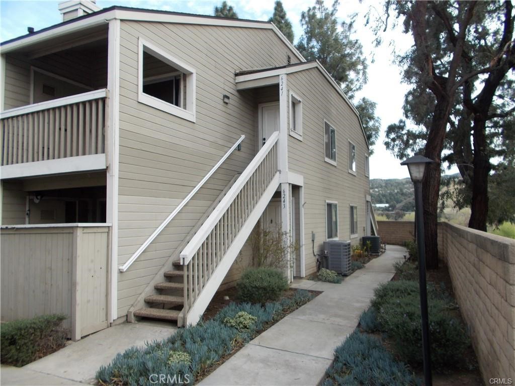 Beautifully updated 3-bedroom, 2-bathroom home with a 2-car garage, located near Savi Ranch shopping center. Newer laminated wood and carpet flooring, Designer paint colors, and recessed lighting are just a few of the modern touches. Featuring a cozy fireplace. Light & bright updated kitchen with lots of cabinets. Recently remodeled bathrooms. Master bedroom with vaulted ceilings. Bedrooms and family room with ceiling fans, a Newer A/C unit. Laundry on the balcony includes a washer and dryer!!! The community has a pool & spa, playgrounds, BBQ areas, and more