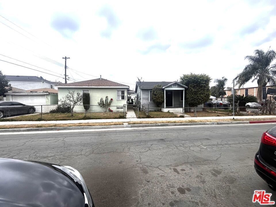 Situated on a spacious corner lot, this unique property features two separate single-family homes, each with its own private entrance and individual driveway, offering privacy and convenience for extended families, rental income, or investment opportunities. Each home includes 2 bedrooms and 1 bathroom, with comfortable layouts and generous living spaces. While both units are in need of updates and repairs, they offer a solid foundation and great bones, making them ideal candidates for renovation or customization. While the property is in need of updating, it holds tremendous potential for the right buyer to enhance and personalize. Whether you're considering multi-generational living, income generation, or simply building equity through renovation, this is a chance to make a meaningful impact. The lot offers ample outdoor space, and the property's location provides easy access to major freeways, schools, local parks, and shopping centers, all valuable features for future tenants or residents. The surrounding neighborhood reflects a sense of community and ongoing revitalization, adding to the long-term appeal. With solid fundamentals and a world of possibility, this is a fixer-upper worth exploring. Don't miss the chance to bring new life to this corner-lot gem and unlock its full value.