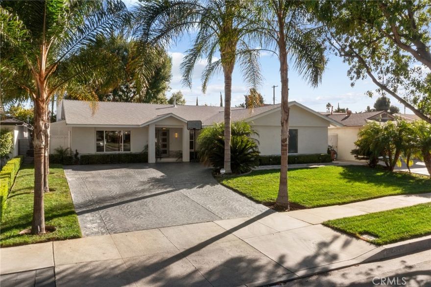 Welcome to this beautifully reinvented 4 bedroom, 3 bathroom home in the heart of West Hills. Featuring 1,918 sq ft of living space on a generous 8,906 sq ft lot of immaculate, taken care of landscaping, this residence has been thoughtfully updated from top to bottom with modern finishes and quality upgrades. The open floor plan offers a spacious living room, formal dining area, built-in kitchen dining nook, and a convenient laundry room off the kitchen. The oversized 2-car garage and large driveway provide parking for up to 6 cars along with abundant storage, while the expansive entertainer’s backyard is perfect for gatherings and outdoor living. Recent improvements include all new windows except one (2020), a new roof with radiant heat shield sheathing (2020), smooth stucco finish (2020), remodeled dining/fireplace room (2020), new HVAC ducting (2022), a fully remodeled primary bath and new primary flooring (2024), enlarged HVAC returns for higher efficiency (2024), two additional remodeled bathrooms (2025), and a new electrical panel (2025). Excellent storage inside and outside the home includes multiple deep closets and a waterproof outdoor built-in storage room. Located on a quiet street at a stop sign, this home enjoys the privacy and low traffic of a cul-de-sac without being on one. Designer details include fiber optic star light ceilings in three bedrooms, crown molding throughout, solid-core doors, and instant-on hot water in the bathrooms. With every detail carefully considered and updated, this move-in ready home offers the perfect combination of style, comfort, and functionality.