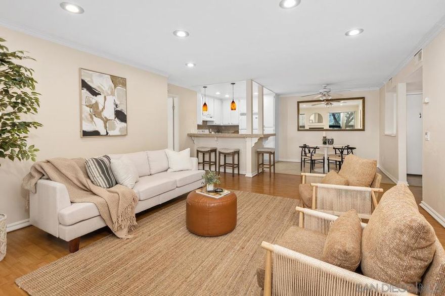 Beautiful second-floor condo in desirable Mission Ridge! Features a popular split floor plan, bright open layout with large windows, and patio overlooking the mountains. Covered assigned parking. Premier amenities include swimming pool & spa, tennis/racquetball courts, sauna, fitness center, a welcoming clubhouse,  outdoor barbecue & picnic area. Centrally located. Close to Snapdragon Stadium, shopping, Restaurants. Minutes to the I-8, I-15 freeways. Minutes to the trolley, easy commute downtown, 15 minutes to the beach.