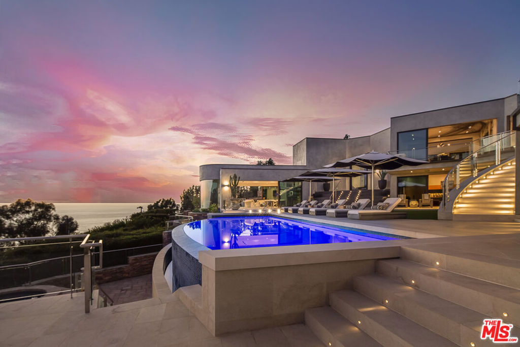 Situated just minutes from the prestigious Montage Laguna Beach resort and less than a mile from some of the most scenic and secluded beaches in Southern California is this unparalleled estate. Displaying spectacular articulation of light, space, and fine design, set amid 12 unobstructed acres of native California landscape, this thoughtfully constructed estate property is enveloped by breathtaking views of the Pacific creating a harmonious connection between its refined interiors and the surrounding environment. The epitome of luxuriant California living wonderfully scaled spaces open to expansive terraces, a sparkling resort-like pool, and entertaining veranda. Every consideration was accounted for when composing this sophisticated property with the leading technological advancements in home automation; a multimillion-dollar fire suppression system; a state-of-the-art theater, elevator, facilities for multiple fitness activities, five primary-like bedrooms with en suite baths, a myriad formal and informal rooms for living and hosting guests; and interiors graced with the vision and finish selection of an Architectural Digest Top 100 designer. One of the region's most significant architectural presentations. The property's intrinsic benefits of arguably equal value have optimal proximity to the area's finest amenities while offering abundant open space, and nonpareil privacy, all affording a lifestyle beyond compare. Sale includes APN #658-03-11.