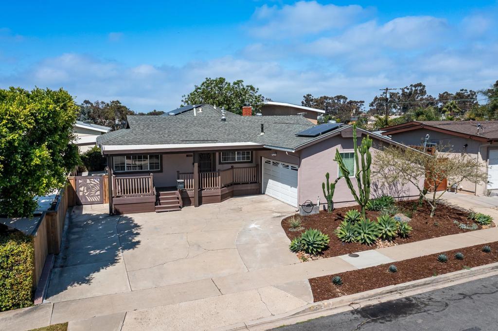 Wow! Looking for that turn key single story home with great access all around San Diego? Here it is. This home has been meticulously maintained and has some amazing features such as fully owned solar, newer dual pane windows, tankless water heater, freshly retextured and painted interior, new wide plank flooring through out, and enormous dining area and family room with soaring vaulted wood beamed ceilings and large fireplace. The covered front porch sets the tone for the entry and space abounds. The kitchen offers ample cabinet space, a Bosch silent dishwasher, and loads of counter space for meal prep. The yard is well thought out and has numerous fruit trees and a raised covered patio off the fining area to catch the great San Diego breezes. The home is walking distance to both Sharp Memorial Hospital and Radys Childrens hospital and conveniently located off the 805, 163, 52 and the 8 freeways making access to almost anywhere in San Diego a breeze. You won't want to miss out on this great home!
