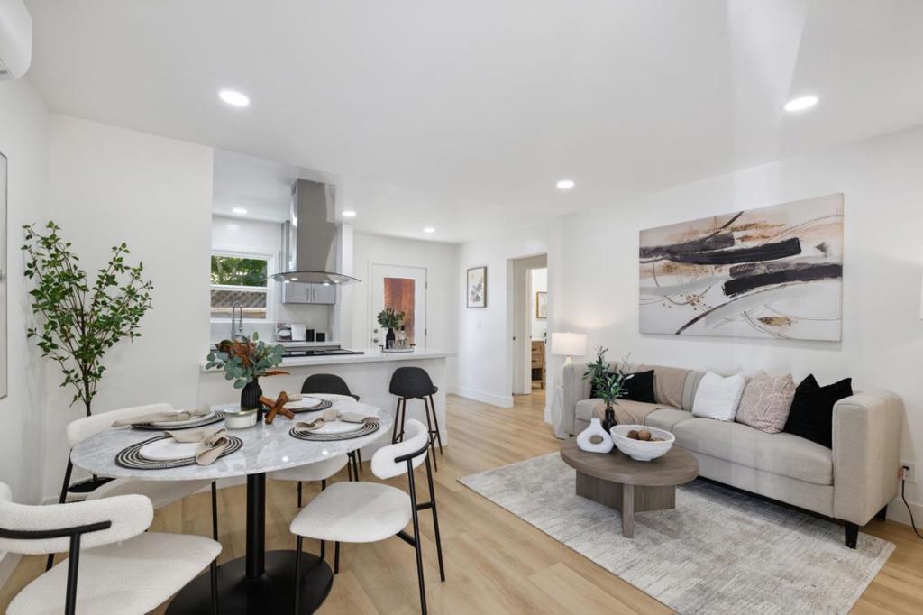 Tucked away on an expansive lot in one of San Joses most sought-after neighborhoods, this beautifully updated 2-bedroom, 1-bath home offers the perfect blend of charm, modern comfort, and untapped potential. Step inside to discover a bright, open-concept layout featuring oversized windows that flood the space with natural light, sleek new flooring, upgraded electrical, and a walk-in closet for added convenience. The stylish kitchen is equipped with all-new stainless steel appliances, and the brand-new garage door adds a fresh touch to the exterior. Outside, the large front yard opens the door to endless possibilitieswhether you envision an ADU for rental income, multigenerational living, or future expansion. Additional upgrades include a brand-new fence and fresh landscaping, creating inviting curb appeal. Just minutes from shopping, San Jose City College, and major highways, this turnkey gem offers comfort, convenience, and incredible investment upside. Dont miss the chance to make this versatile property your next move!