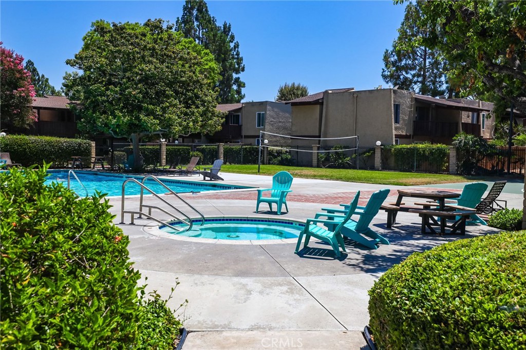 Location, Location, Location! Ground-level condo (no stairs!) in the highly desirable, 24-hour guard-gated MacArthur Village community. This beautifully upgraded unit features stylish wide-plank laminate flooring throughout (no carpet), smooth ceilings, upgraded baseboards, paneled doors, and dual-pane windows with plantation shutters (lifetime warranty). The open floor plan includes a modern kitchen with white cabinetry, quartz countertops, and stainless steel appliances. The spacious bedroom suite offers a large walk-in closet and an updated bathroom. Enjoy peaceful greenbelt views from this quiet, private location that doesn’t face another unit.Additional features include: wall A/C unit, ceiling fan, assigned carport, and ample guest parking. Community amenities include 3 pools, 5 spas, clubhouse, 4 tennis courts, basketball & volleyball courts, BBQ/picnic areas, and a fitness center. HOA dues include water and trash. Not on leased land. Prime South Coast Metro location—walking distance to South Coast Plaza, Metro Pointe, Segerstrom Center, and more. Quick access to 405, 55, 73, and 5 freeways. Great as a primary residence or investment opportunity!