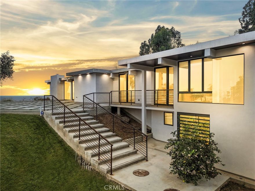 Experience Elevated Coastal Living in Big Rock



Perched high above the Pacific on over 1.20 acres of usable land, this exceptional property offers the rare opportunity to own a piece of Malibu’s storied Big Rock community. Originally graded and subdivided by Pierce Sherman of Pacific Palisades, Big Rock encompasses 240 properties and 208 homes—yet few compare to this stunning retreat.



Positioned with a southwest orientation, the newly built 2-bedroom, 2-bathroom residence showcases striking modern architecture and visionary design. Every detail reflects the latest in smart home technology and eco-friendly living, allowing you to seamlessly control and enhance your lifestyle. The stone work in the bathrooms are floor-to-ceiling Porcinosa specialized ceramic slabs imported from Spain. The flooring is engineered wood in 9-in planks.



The property’s unobstructed 200° panoramic views capture the very essence of Southern California’s coastline: crashing ocean waves, sweeping sunsets, and endless horizons that transform daily life into a masterpiece.



Imagine waking each morning to the soothing sounds of the ocean, with expansive grounds that offer both tranquil privacy and endless possibilities—whether you dream of expanding, entertaining, or simply embracing peace and seclusion.



This is more than a home. It’s a coastal sanctuary where modern luxury meets timeless natural beauty.