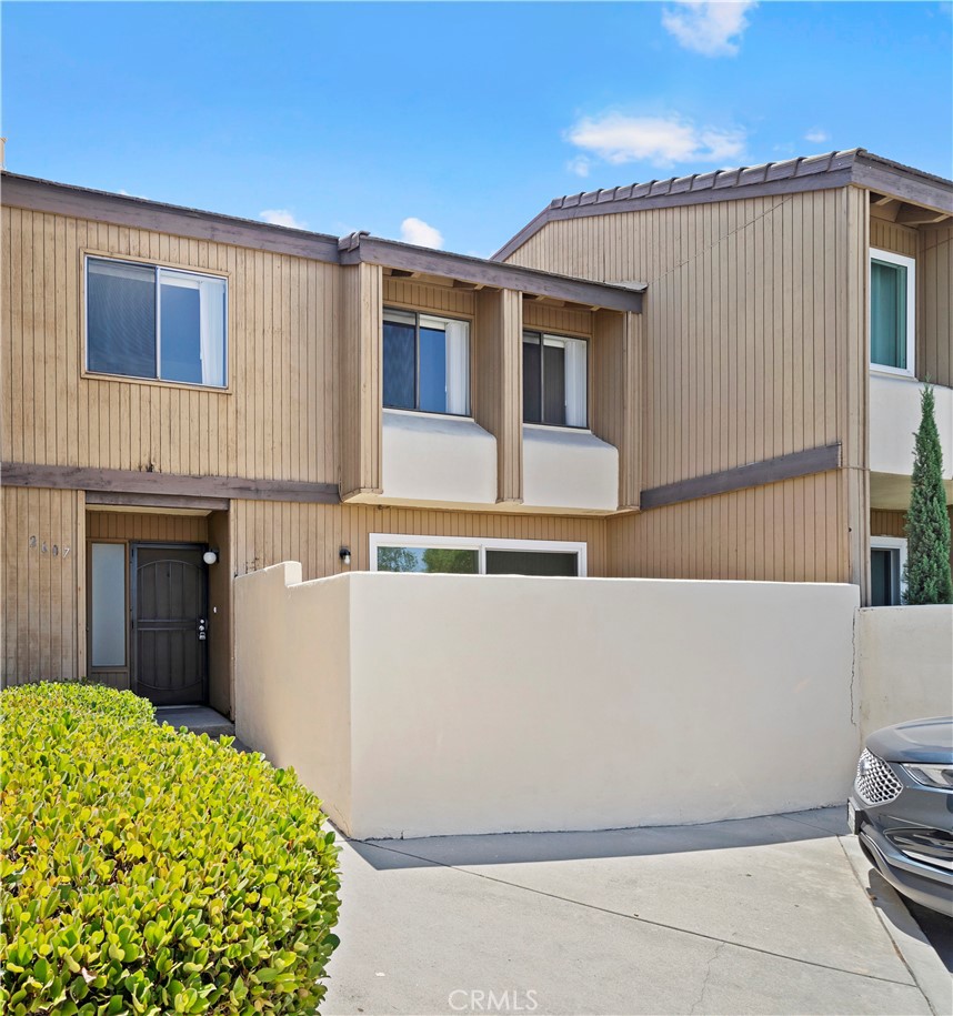 Step into this beautifully updated 2-story condo in a prime Anaheim location—just a short 1-mile stroll to all the excitement of Downtown Disney, Disneyland, and California Adventure Park. This cozy 2-bedroom, 1.5-bath home showcases an updated kitchen with a 4-burner Whirlpool gas stove, clean quartz countertops, and a bar seating area that's ideal for casual dining or hosting extra guests.
The open-concept living and dining rooms feature luxury vinyl wood flooring, baseboard molding, and a warm rattan flushmount light fixture that adds a beachy touch (you are just 20 minutes away from Newport Beach and Balboa Island, after all!). A new sliding glass door opens onto a private patio, offering that coveted California indoor-outdoor living experience.
As you make your way back toward the entrance, you'll pass by the laundry room, conveniently located next to the living room. In addition to its functionality, the laundry room is surprisingly spacious and offers a versatile bonus area—add a cabinet or desk and use it as a small home office, craft space, or for extra storage.
Upstairs, the primary bedroom wows with beautiful vaulted wood-plank beamed ceiling, a huge walk-in closet, and an ensuite bathroom featuring quartz countertops, a brand-new single white vanity, and a modern shower/tub combo. There is a second bedroom with big windows and a large reach-in closet. Additional storage is provided by a convenient entry hall closet downstairs and charming built-in cabinetry upstairs. Enjoy year-round comfort with a Nest thermostat and central HVAC system.
This unit also includes a private one-car garage, a dedicated parking space directly out front, and an additional guest parking spot. One pool FOB is provided as well.
The Kaleidoscope HOA offers fantastic amenities, including a playground, expansive grassy areas, a community clubhouse, and resort-style living with two large pools and a hot tub. The monthly HOA fees cover trash, water, and sewer for residents.
Located within walking distance to Disneyland, this property offers quick access to Downtown Disney, shopping, dining, Angels Stadium, the Honda Center for concerts, numerous parks, entertainment, and easy access to major freeways.
Don’t miss your chance to own this incredible property in the heart of Anaheim—ideal for investors, vacation home seekers, or anyone looking to enjoy all that the Disneyland area has to offer!