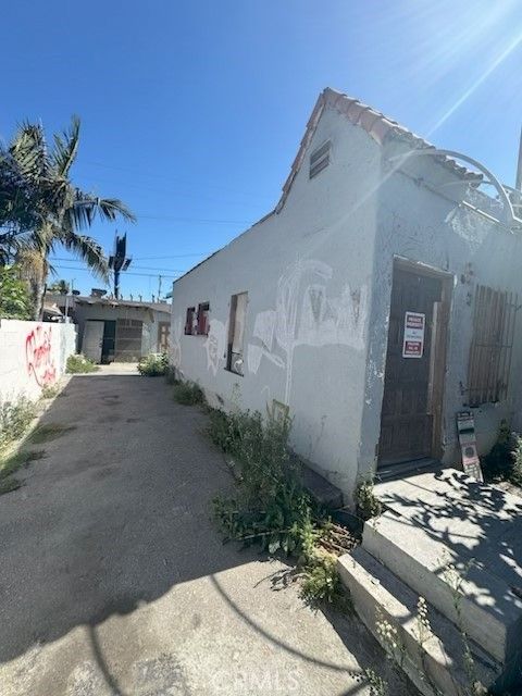 Photo of 2408 E 115th Pl, Los Angeles, CA 90059 (MLS # PF26082782)