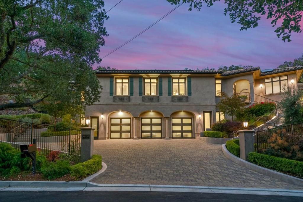 Stunning custom Mediterranean estate boasts a private setting on 1.45 acres with peaceful views of the Los Gatos hills. This 5,166 sf, 5 bedroom, 4.5 bathroom home exudes sophisticated elegance and comfort with soaring 12 ceilings, wide plank hardwood floors, custom mill work and generous rooms. Impeccable quality and craftsmanship blends tasteful design and modern high-end amenities throughout. The beautifully maintained landscape features a Cabernet vineyard, flower covered trellises, illuminated gardens and a private patio that is an ideal setting for gatherings or quiet relaxation. The grounds also include room for a pool, additional vineyard, sport court, or possible ADU. Close to vibrant downtown Los Gatos with casual and fine dining, boutique shopping, Farmers market, community events and hiking/biking trails. Distinguished Los Gatos schools.