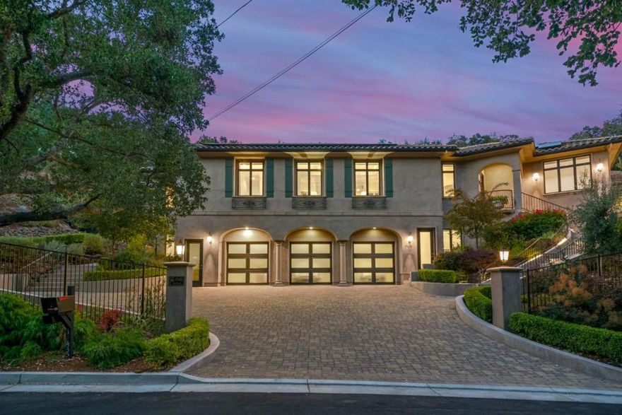 Stunning custom Mediterranean estate boasts a private setting on 1.45 acres with peaceful views of the Los Gatos hills. This 5,166 sf, 5 bedroom, 4.5 bathroom home exudes sophisticated elegance and comfort with soaring 12 ceilings, wide plank hardwood floors, custom mill work and generous rooms. Impeccable quality and craftsmanship blends tasteful design and modern high-end amenities throughout. The beautifully maintained landscape features a Cabernet vineyard, flower covered trellises, illuminated gardens and a private patio that is an ideal setting for gatherings or quiet relaxation. The grounds also include room for a pool, additional vineyard, sport court, or possible ADU. Close to vibrant downtown Los Gatos with casual and fine dining, boutique shopping, Farmers market, community events and hiking/biking trails. Distinguished Los Gatos schools.