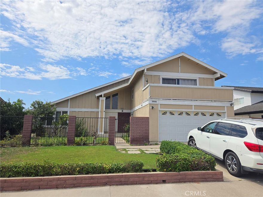 Beautifully upgraded 2-stoty home with 4 bedrooms and 3bathrooms in excellent neighborhood of Fountain Valley. This spacious home has vaulted ceilings, living room, formal dining room, family room with a cozy fireplace for perfect gatherings, Remodeled kitchen, baths. Master suite with double door, walk-in closet, deep bathtub for relaxation, and a private balcony, central AC/Heating. Front yard with gate, backyard with fruit trees. Walking distance to Ethan B. Allen Elementary School, and convenient freeway access.