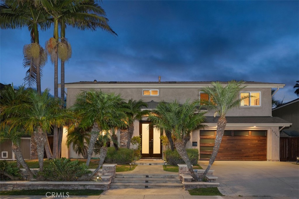 Where timeless design meets breathtaking natural panoramic views that will finally take you to YOUR dream home! Set on an expansive lot in the heart of Laguna Niguel, in a sought after neighborhood with NO HOA, this exceptional 5 bedrooms/4 bathrooms has open space with long sight lines to hills, mountains, and spectacular city lights at night.
Inside, travertine and wood floors, solid-core doors, Milgard double-pane windows, recessed lighting, and multiple skylights create crisp, all-day light. The gourmet kitchen is a chef's dream come true, custom cabinetry newly refinished, six-burner range, Sub-Zero fridge, breakfast bar, and a custom desk nook that flows seamlessly to the living room and dining spaces for refined entertaining. A much sought after main-level bedroom/office steps out into the manicured private yard. The downstairs bathroom offers indoor/outdoor access creating convenience after a sun soaked afternoon. From the custom pool and spa to an outdoor shower, every meticulous detail was designed for coastal living. Multiple tiers of landscaping of fruit trees and jacarandas frame this majestic backdrop. Built for convenience, this home features two laundry areas upstairs and downstairs to keep life moving with ease.
Upstairs, you will find four additional bedrooms include an inviting primary en suite with walk-in closet opening to a separate retreat area showcasing stunning sunset views. The primary includes tub, shower, and dual vanities. Along with three more spacious bedrooms with two offering picturesque mountain views you will be in awe of. The fourth bedroom, facing the front of the house has an expansive retreat/office nook with a stylish loft perfect for creativity.
Just minutes from world class beaches , bike trails, hiking coastline trails, fine dining, and top rated schools. This home is more than just a residence, it's an exceptional masterpiece! This place is a hidden gem waiting for you to call it your home.