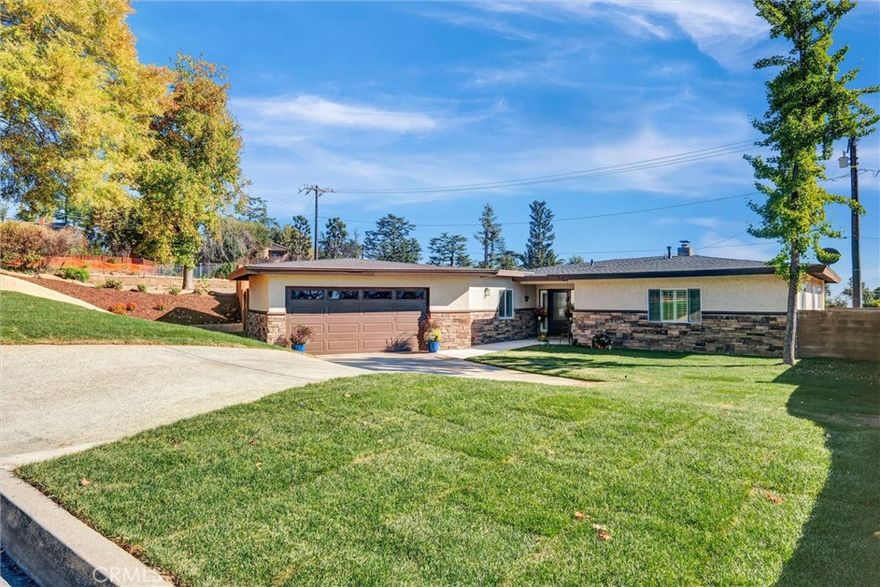 Elegant Newly Remodeled Home in Coveted New Altadena!!!



Experience refined living in this beautifully remodeled 3-bedroom, 2-bath residence, ideally located in the highly sought-after New Altadena community. Designed with timeless sophistication and modern comfort, this turnkey home is truly one of a kind. Freshly painted inside and out, the property makes a striking first impression with its Chardonnay Stone façade and custom front door, welcoming abundant natural light into the entryway. Wide-plank Elland Road Elm flooring by Home Decorators Collection flows seamlessly throughout, connecting the formal living room, inviting dining room, and a separate family retreat. A versatile laundry/multipurpose room further enhances functionality. The kitchen is a true showpiece, featuring Antique White cabinetry with elegant crown molding, Calacatta quartz countertops, and brand-new stainless-steel appliances, including refrigerator, range, microwave, wine cooler, washer, and dryer. Both bathrooms have been fully remodeled with LED shower panel systems that blend sleek design with spa-like luxury; the master bathroom is further elevated with timeless Tuscany tile. Each bedroom is thoughtfully appointed with SKYTTA sliding closet doors, plantation shutters, and ceiling fans, while crown molding and upgraded baseboards add a refined finishing touch throughout. Plantation shutters also frame the sliding glass doors, providing both elegance and privacy. Outdoors, a spacious backyard and side yard offer the perfect setting for entertaining or private relaxation, complemented by a two-car attached garage with ample storage. Blending stylish upgrades with classic character, this residence is a rare opportunity in a rapidly appreciating neighborhood, truly a home not to be missed.