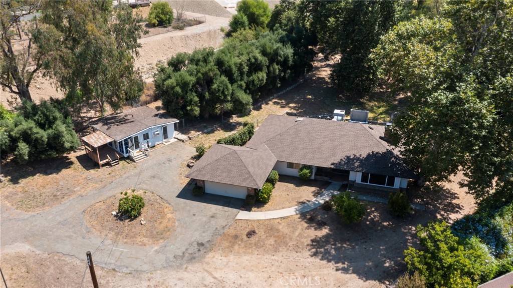 Tucked away in the peaceful North Park neighborhood of San Bernardino, this gated 1.4-acre property offers spectacular mountain views, usable flat land, and incredible potential for customization.
The main house (approx. 2,237 sq ft, built in 1968) features 3 bedrooms, 2 bathrooms, an spacious kitchen, upgraded main bathroom, and a bonus room ideal for a home office, gym, or extra bedroom, and a dedicated laundry unit. A detached ADU (approx. 512 sq ft, built in 1920) offers 1 bedroom, 1 bathroom, and its own indoor laundry — ideal for guests or extended family.
This property is zoned RS (Residential Suburban) by the City of San Bernardino, which allows for private stables and horse-keeping, making it a rare opportunity for equestrian enthusiasts.
Located just within 1 mile of Hillside Elementary, a top-rated magnet school with a Gifted & Talented program, this home offers both lifestyle and location. Enjoy quiet, residential surroundings with easy access to freeways 210 & 215, Cal State San Bernardino, and local shopping including Walmart.
While the home needs some TLC, it is priced accordingly and presents a unique chance to own a large, flexible property with outstanding long-term value. Inspection report and floor plan available upon request.
