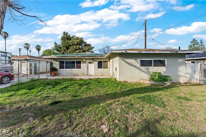 Opportunities Like This Don’t Come Often! Welcome to this one-of-a-kind property located in a prime Ontario location! Whether you're a large family, business owner, work from home, this expansive lot offers endless possibilities for growth, development, and personal enjoyment. Situated just minutes from I-10, I-15, SR-60, and Ontario International Airport, this location provides easy access to all the amenities and major transportation routes you need. This unique property features three distinct structures, making it ideal for a variety of purposes. The main House is a charming 3-bedroom, 2-bathroom residence with a spacious bonus room that can be used as additional living space. This home offers a cozy and functional layout perfect for families or anyone looking for living in a great location. The second structure is a versatile studio, perfect for a home-based work, an office space for professionals, or even as a cozy granny flat or rental unit. This space provides excellent potential for extra income or as a private retreat for family members. It’s a gem for those who need a dedicated work area without compromising the comforts of home. The third structure is a large barn that can be transformed into a variety of things. Whether you’re looking for a workshop, storage space, or a place to host large events, this barn offers ample room to bring your ideas to life. The possibilities are only limited by your imagination! The enormous lot continues to offer more than enough space for all your needs. Whether you're looking to park your RV, store vehicles, or house equipment, there’s plenty of secure storage space. The vast backyard is perfect for personal use, with room for gardens, outdoor entertainment. Two large trees in the back yard provide ample shade, making this the perfect spot to relax or work while enjoying the outdoors. Whether it’s a summer BBQ, outdoor office space, or a peaceful retreat from the world, the space is designed to suit all kinds of lifestyles. The prime location, versatile layout, and endless opportunities make this property an incredible investment. It’s perfect for a growing family, those in need of multi-generational living spaces, business owners looking for an office or rental potential, or anyone who needs ample room for work, play, and storage. Don't miss out on this rare opportunity. With its unique features and incredible potential, this property is a dream come true for the right buyer!