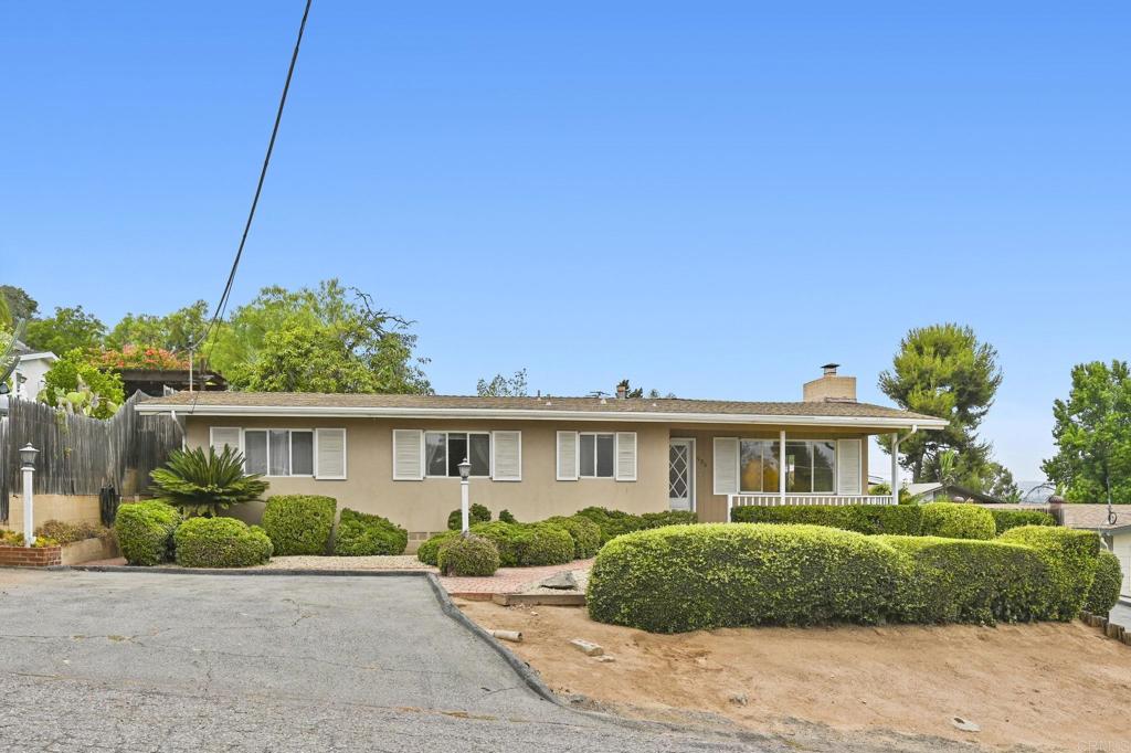 Wonderful West Escondido single story three-bedroom family home with outstanding easterly back country and mountain views. This quaint home has been in the family for over 50 years. It offers so much potential with its solid bones and great location, a buyer is going to love living here. Original hardwood flooring in the Living room, hall and all three bedrooms, and also new carpeting in the family room. The enclosed patio offers a great place to stay cool while enjoying the view of the large back yard. Located in a quiet neighborhood, the oversized 10,100 sq. ft. lot offers tons of potential, room to expand the existing home or add an ADU. The lot is totally usable; a section has an easy turf lawn installed making it an amazing place for pets and kids to play. Family Fruit orchard has mature producing avocado tree, plus an orange and tangerine tree. Oversized single car detached garage with long driveway offers plenty of off-street parking. Located close to Downtown Escondido and the Hwy 15 offers an easy commute and easy access to restaurants, boutiques, parks, and entertainment.