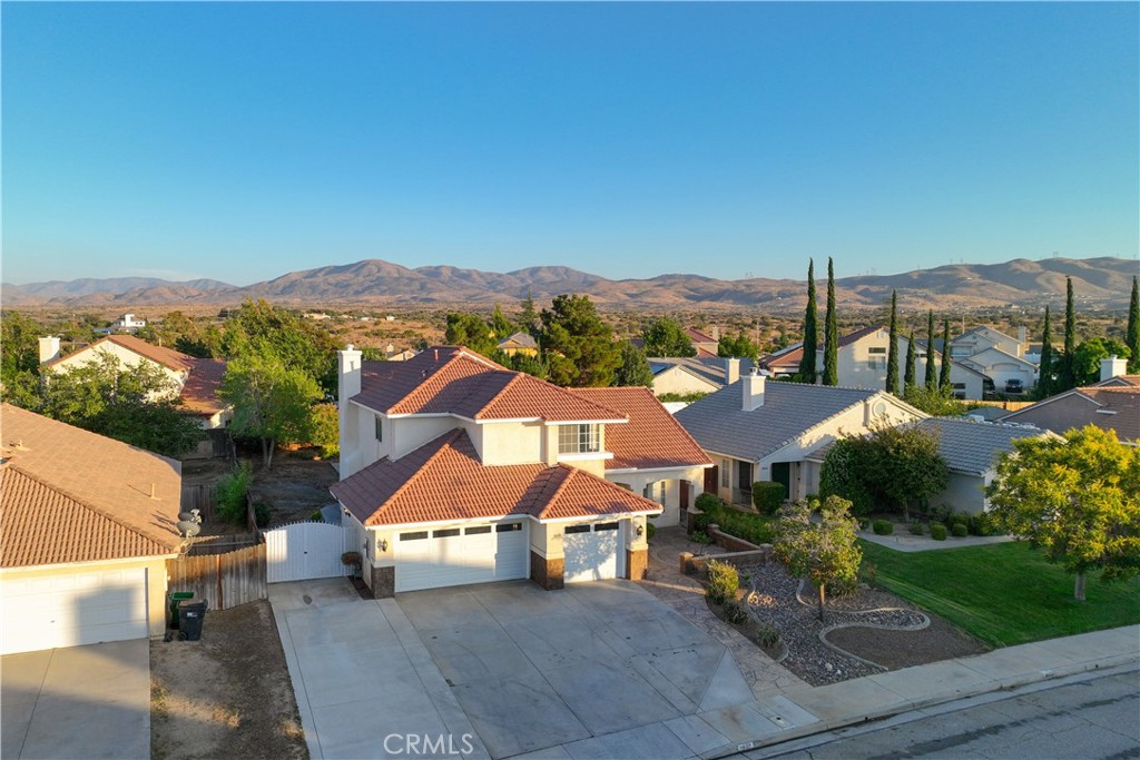 **Stunning Renovated Home in ''The Terraces'' - Turnkey with Exceptional Outdoor Living & 3-Car Garage** Welcome to this beautifully renovated home located in the highly sought-after neighborhood of *The Terraces*. From the moment you arrive, you'll notice the exceptional attention to detail and nearly \$100,000 invested in the professionally designed front and backyard. Featuring custom concrete work, an expansive patio perfect for entertaining, and a massive lot with room to grow, this outdoor space is truly a private oasis. Step inside to luxury vinyl plank flooring throughout, sleek quartz countertops, new stainless steel appliances, and elegant plantation shutters. The open and inviting layout is perfect for modern living, offering both comfort and style. Additional highlights include a spacious 3-car garage, RV parking, and the unbeatable charm of a neighborhood known for its pride of ownership and strong community feel. This is a rare opportunity to own a turnkey home with premium upgrades in one of the most desirable areas around. Don't miss your chance!