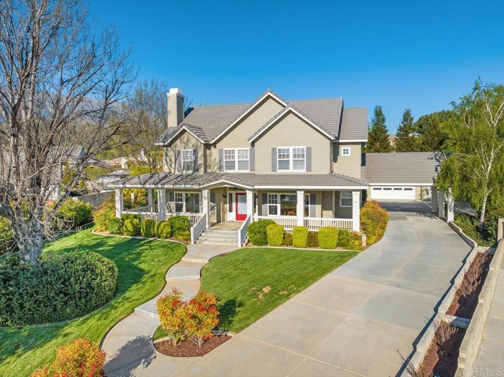 Exquisite custom-built estate located in upper Yucaipa. Inspired by the owner’s 19th-century Redlands heritage home, this custom-built residence showcases exceptional craftsmanship and exquisite attention to detail throughout. Inside, the home features a thoughtfully designed floor plan that includes a grand great room with floor-to-ceiling windows, a formal living room with fireplace, a formal dining room, and a spacious kitchen with a large center island, granite countertops, stainless steel appliances including double ovens and an oversized French door refrigerator, a cozy breakfast nook. Distinctive architectural details include custom woodwork, built-in cabinetry, casement crank windows, transom windows above doors, imported hair bow faucets, a wall-mounted pot filler, real hardwood floors, and plantation shutters throughout. The upstairs primary suite is a private retreat featuring a luxurious en suite bathroom with a dual-head walk-in shower, soaking tub, and a generous walk-in closet. Three additional bedrooms provide ample space for family or guests. Outside, enjoy your own private oasis with a covered patio, a sparkling POOL with a water feature, and beautifully landscaped grounds that offer privacy and tranquility. A long driveway lined with white birch trees adds a picturesque approach to this extraordinary property as well as an offset 4 car garage equipped with 220-volt electrical and plumbing, The perfect space for an ADU.This home is a rare blend of classic inspiration, modern comfort, and timeless elegance—truly one of a kind.