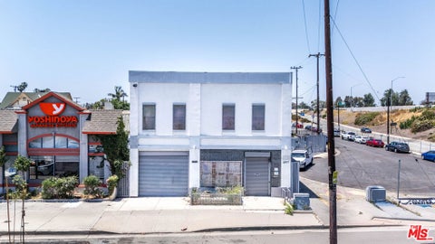 Photo of 2207 S Vermont Avenue, Los Angeles, CA 90007 (MLS # 26844961)