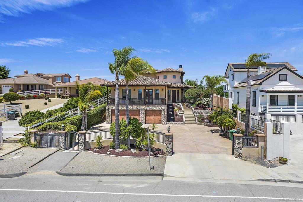 **PRICE IMPROVEMENT** Located in the heart of West Murrieta, this sprawling Mediterranean home was designed to entertain throughout. Upon entering, you are immediately greeted with a large, radius staircase that surrounds the grand foyer, ushering you into the main floor of the home. The incredibly well thought out kitchen is adorned with custom floor-to-ceiling cabinets, an oversized 48” stainless steel, built-in refrigerator, double-ovens, 6-burner cooktop, built-in wine fridge, granite countertops, and a custom mosaic backsplash; it’s a chef’s dream. Boasting 4 bedrooms, 4 and half bathrooms, a large oversized primary suite, massive walk-in closet, fireplace and private balcony offering views to the south. Upstairs you will find 3 bedrooms and a loft area; perfect for a small office or play area. Just steps from the kitchen, you are greeted by the large custom saltwater pool w/slide, a six-person hot-tub, and covered patio, making it a perfect area for a quiet evening or a summer party. Offering a full 3-car garage and private-gated driveway, this amazing property has plenty of room for all of your toys.