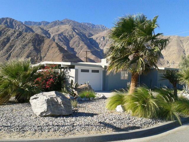 This Gorgeous Mid-Century 2/1 Home with Stunning Mountain Views is TURNKEY FURNISHED and Available Now. Open concept living with a beautiful decorative fireplace and private hot tub available. Classic tile touches in kitchen and bathroom with all the modern conveniences needed for a relaxing place to call home.This San Jacinto Cove home offers a 1-car garage and additional off street parking. Less than 10 minutes to Downtown Palm Springs! Property is in Will consider dog with pet deposit.