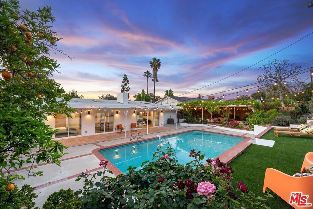 Photo of 23020 Lita Place, Woodland Hills, CA 91364 (MLS # 25594747)