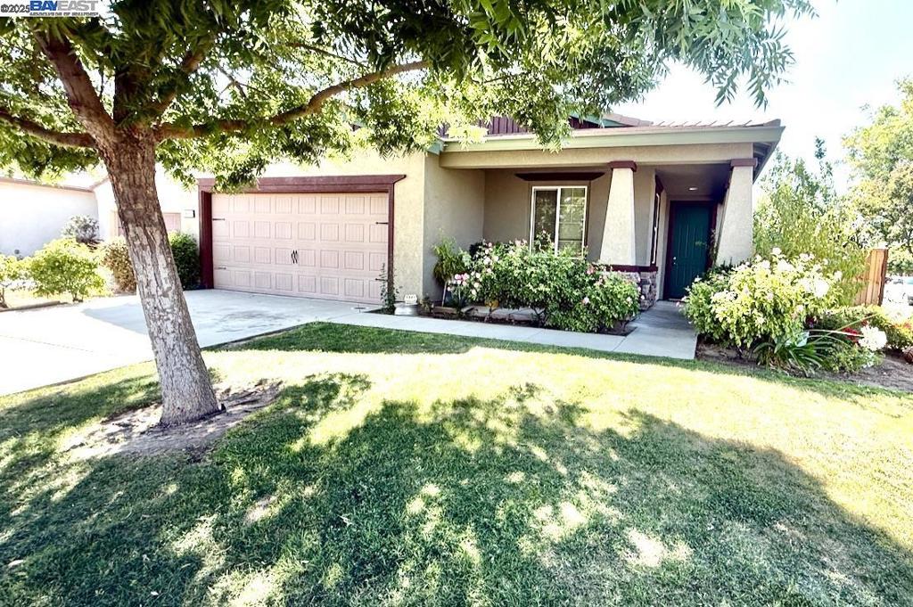 Beautifully updated 3-bedroom, 2-bath home perfectly situated on a desirable corner lot with potential RV access, offering plenty of space and flexibility. Fresh interior paint creates a bright and welcoming atmosphere throughout. The spacious kitchen is well-appointed and opens seamlessly into the expansive living and dining areas, which are filled with natural light perfect for entertaining or relaxing with family. The primary bedroom features a large walk-in closet and a private ensuite bath, providing added comfort and privacy. The generous garage offers ample space for both parking and storage. Conveniently located near shopping centers and dining options, this move-in ready home is an excellent choice for families, first-time buyers, or anyone seeking a blend of comfort, style, and convenience in a sought-after neighborhood