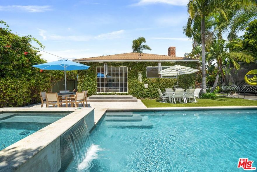 Stunning, Private, Lush Garden Pool Oasis on 1/4 acre lot!  Spectacular Personal Resort which perpetuates the feeling of a Spa in Italy. Swim under the stars within a large and beautiful LED Heated Pool that comes with an automatic pool cover for safety .  Watch an Outdoor Movie set between 15 foot tall Silver Sheen trees which whisper in the wind with various Baritone, Soprano & Tenor wind chimes or just sip wine in your Waterfall candle lite Heated Spa/Jacuzzi . Bathed in sunlight, taking advantage of the HUGE Entertainment Play Area with Springless Trampoline, swing chairs, multiple seating vignettes , and outdoor BBQ area set behind large privacy hedges which makes this a Soulful Retreat !  3 bedroom/ 2 bathrooms . The pristine foyer/kitchen/dining open floor plan comes with custom Birch cabinetry and lush newly refinished Brazilian hardwood floors. Top of the line Wolf Appliances, Fisher & Paykel Dual Dishwasher, French Door Refrigerator, and Microwave. Large family living room with gas fireplace with black glass for accents. Master bedroom with custom closet , en suite bathroom and his & her dual shower heads on opposite sides of  glass tiled walls with body sprays.  Don't miss this  Venice Jewel!  It's a "Dream Come True"!